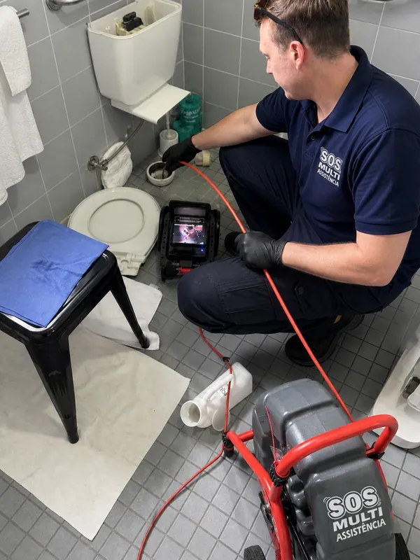 Clearing a blocked drain